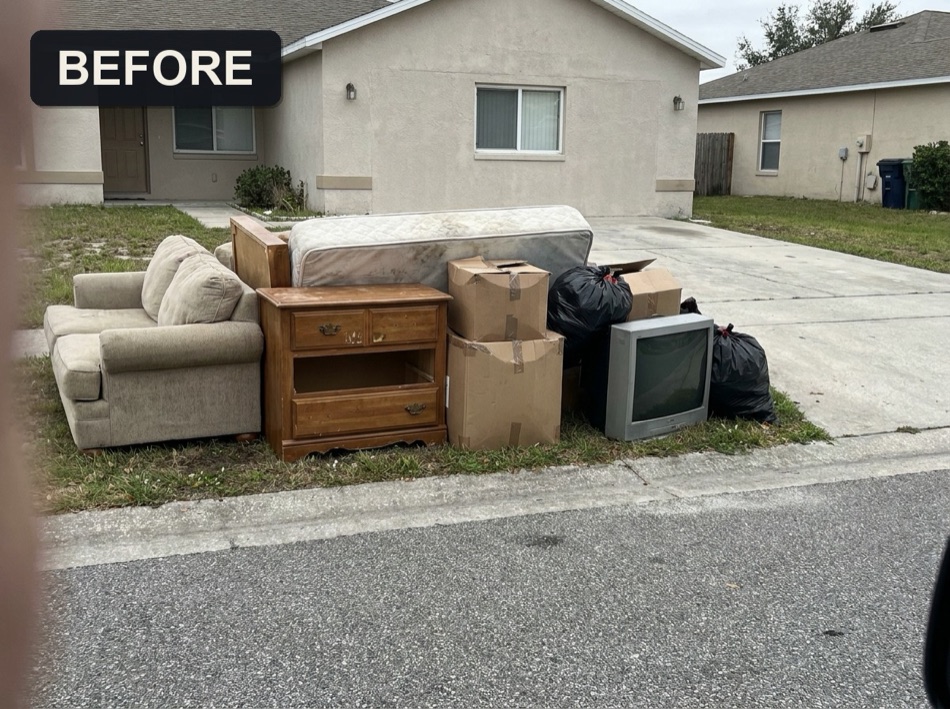 Pile of old furniture and junk at the curb, before